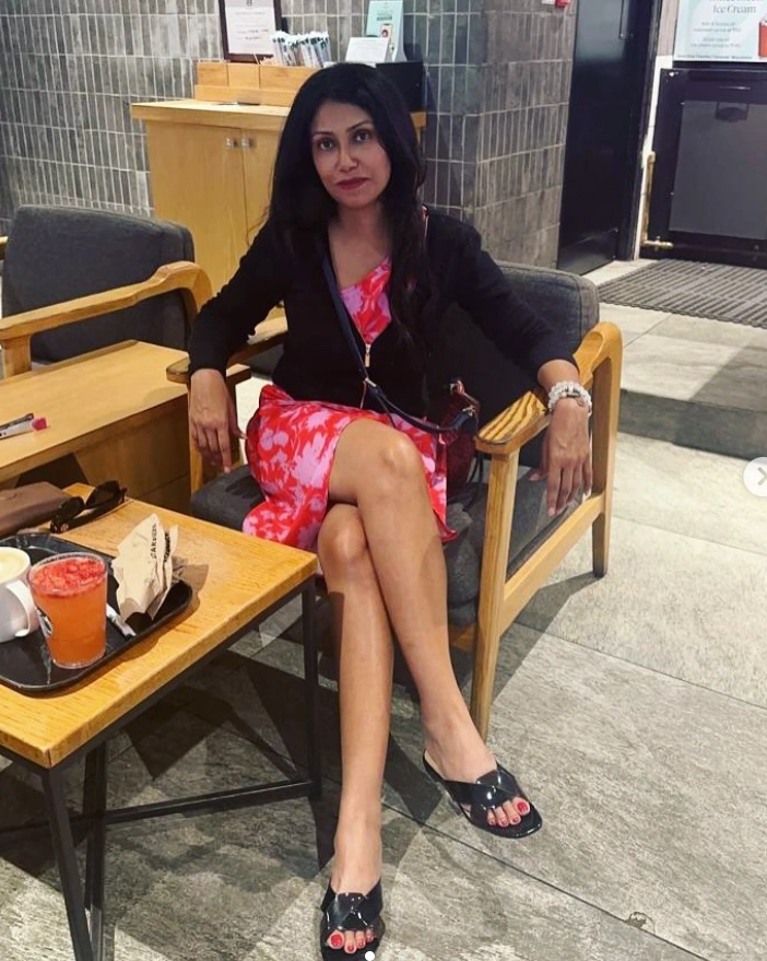 Tanushree Ghosh seated in an armchair